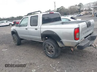 2001 Nissan Frontier SE z VIN 1N6ED27T91C318489, wystawiony jako IAAI lot #41441798 z przebiegiem 214 834 mil mil oraz . Historia ofert i sprzedaży dostępna na DreamBid. Obrazek 3.