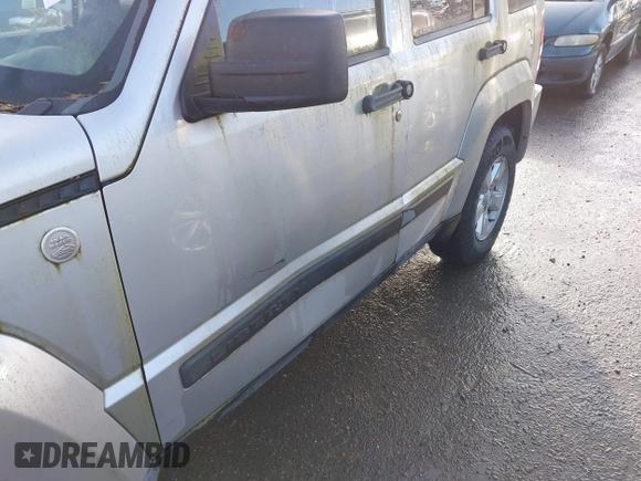 2010 Jeep Liberty Sport with VIN 1J4PN2GK0AW153442, listed as a IAAI auction lot 41732415 with 206,834 mi miles. Bid and sale history available at carsss.com. Image 6.