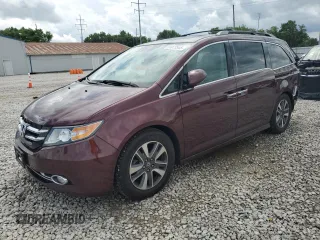2015 Honda Odyssey Touring Elite z VIN 5FNRL5H96FB067842, wystawiony jako Copart lot #61073345 z przebiegiem 107 340 mil mil oraz Szkoda całkowita • Salvage title. Historia ofert i sprzedaży dostępna na DreamBid. Obrazek 1.