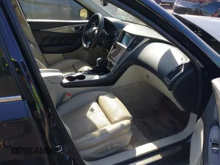 2014 Infiniti Q50 Premium with VIN JN1BV7AR0EM689783, listed as a IAAI auction lot 41661020 with 124,762 mi miles. Bid and sale history available at carsss.com. Image 5.