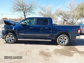 2019 Ram 1500 Big Horn z VIN 1C6RREFT4KN769061, wystawiony jako IAAI lot #41356744 z przebiegiem Nie podano mil oraz . Historia ofert i sprzedaży dostępna na DreamBid. Obrazek 14.