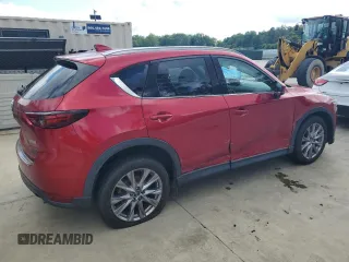 2019 Mazda CX-5 Grand Touring with VIN JM3KFADM2K1657915, listed as a Copart auction lot 56647145 with 85,095 mi miles and Salvage title. Bid and sale history available at DreamBid. Image 3.