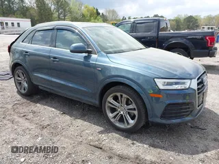 2018 Audi Q3 Premium Plus z VIN WA1JCCFS8JR014631, wystawiony jako IAAI lot #41958696 z przebiegiem 94 063 mil mil oraz . Historia ofert i sprzedaży dostępna na DreamBid. Obrazek 1.