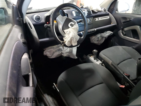 2012 Smart fortwo Pure z VIN WMEEJ3BA3CK570191, wystawiony jako Copart lot #43576165 z przebiegiem 80 511 mil mil oraz Szkody całkowita. Historia ofert i sprzedaży dostępna na DreamBid. Obrazek 8.