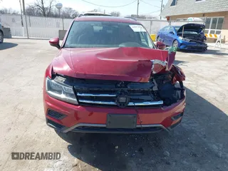 2019 Volkswagen Tiguan SE with VIN 3VV3B7AX3KM130075, listed as a IAAI auction lot 41807584 with 57,308 mi miles and . Bid and sale history available at DreamBid. Image 12.