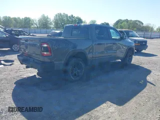 2023 Ram 1500 Rebel with VIN 1C6SRFLT2PN677577, listed as a IAAI auction lot 41991668 with 20,507 mi miles and . Bid and sale history available at DreamBid. Image 4.