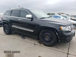 2013 Jeep Grand Cherokee Overland with VIN 1C4RJECG5DC528650, listed as a Copart auction lot 51581684 with 141,050 mi miles and Clean Title. Bid and sale history available at carsss.com. Image 4.