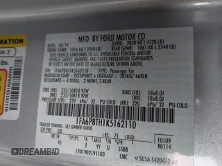 2019 Ford Mustang EcoBoost with VIN 1FA6P8TH1K5162110, listed as a IAAI auction lot 41626756 with 77,317 mi miles and . Bid and sale history available at carsss.com. Image 9.