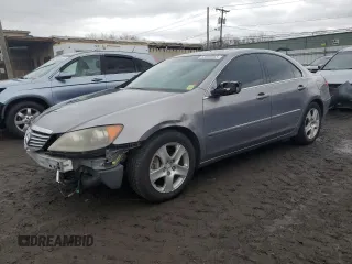 2006 Acura RL with VIN JH4KB16576C010719, listed as a Copart auction lot 53000055 with 221,328 mi miles and Salvage Title. Bid and sale history available at DreamBid. Image 1.