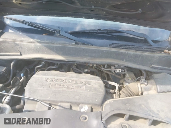 2012 Honda Pilot Touring with VIN 5FNYF4H95CB026191, listed as a IAAI auction lot 42021987 with 229,273 mi miles and . Bid and sale history available at DreamBid. Image 10.