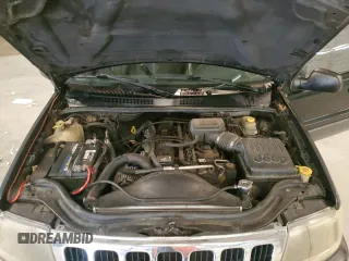 2003 Jeep Grand Cherokee Laredo with VIN 1J4GX48S13C601387, listed as a Copart auction lot 60544295 with 217,485 mi miles and Salvage title. Bid and sale history available at DreamBid. Image 12.