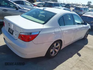 2005 BMW 5 Series 525i with VIN WBANA53565B859447, listed as a IAAI auction lot 41663950 with 99,064 mi miles. Bid and sale history available at carsss.com. Image 4.