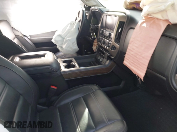 2019 GMC Sierra 2500HD Denali z VIN 1GT12SEY3KF232018, wystawiony jako IAAI lot #41897434 z przebiegiem Nie podano mil oraz . Historia ofert i sprzedaży dostępna na DreamBid. Obrazek 5.