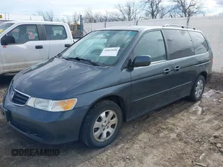 2003 Honda Odyssey EX-L with VIN 5FNRL18903B090800, listed as a IAAI auction lot 41843858 with 201,393 mi miles and . Bid and sale history available at DreamBid. Image 2.