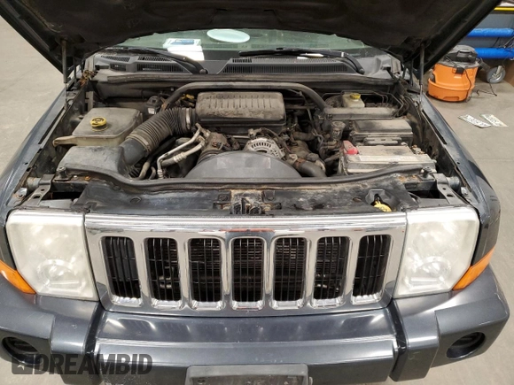 2007 Jeep Commander Sport z VIN 1J8HG48N47C638081, wystawiony jako Copart lot #51793315 z przebiegiem Nie podano mil oraz Szkoda całkowita • Salvage title. Historia ofert i sprzedaży dostępna na DreamBid. Obrazek 13.