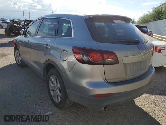 2015 Mazda CX-9 Sport с VIN JM3TB2BV2F0454150, выставлен на аукционе Copart как лот 68082694 с пробегом 166 758 миль миль и Чистый • Clean title. История ставок и продаж доступна на DreamBid. Изображение 2.