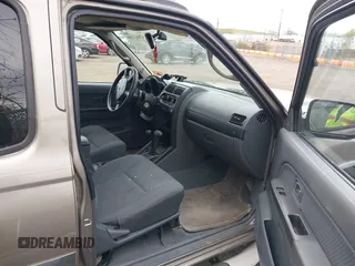 2004 Nissan Xterra XE with VIN 5N1ED28YX4C620046, listed as a IAAI auction lot 42081159 with 173,480 mi miles and . Bid and sale history available at DreamBid. Image 5.