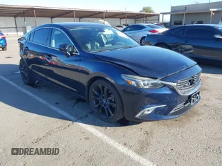 2016 Mazda Mazda6 i Grand Touring with VIN JM1GJ1W50G1488360, listed as a IAAI auction lot 41658193 with 117,712 mi miles. Bid and sale history available at carsss.com. Image 1.