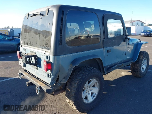 1998 Jeep Wrangler Sport with VIN 1J4FY19S4WP716469, listed as a IAAI auction lot 41506513 with 142,289 mi miles. Bid and sale history available at carsss.com. Image 4.