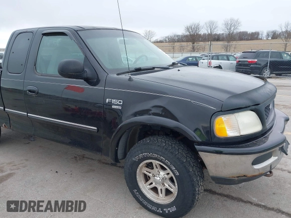 1998 Ford F-150 with VIN 1FTZX1868WKA44830, listed as a IAAI auction lot 41851933 with 240,813 mi miles and . Bid and sale history available at DreamBid. Image 6.