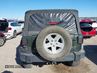 2007 Jeep Wrangler X with VIN 1J8FA24197L205095, listed as a IAAI auction lot 41388452 with 127,051 mi miles and . Bid and sale history available at carsss.com. Image 16.
