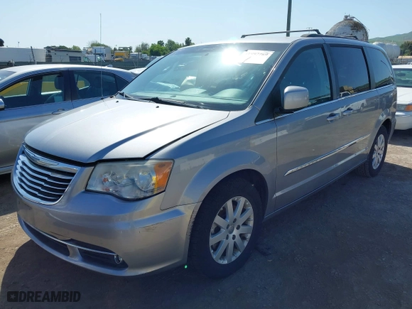 2014 Chrysler Town & Country Touring with VIN 2C4RC1BGXER211850, listed as a IAAI auction lot 41997769 with 164,406 mi miles. Bid and sale history available at carsss.com. Image 2.