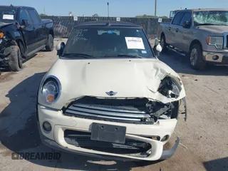 2013 MINI Convertible with VIN WMWZN3C58DT568824, listed as a IAAI auction lot 41998124 with 134,191 mi miles and . Bid and sale history available at DreamBid. Image 12.
