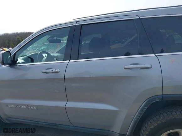 2014 Jeep Grand Cherokee Laredo with VIN 1C4RJFAG7EC243121, listed as a IAAI auction lot 41925695 with 147,999 mi miles. Bid and sale history available at carsss.com. Image 14.