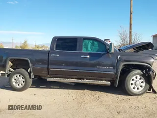 2015 GMC Sierra 2500HD available WiFi Denali with VIN 1GT120E81FF147611, listed as a IAAI auction lot 41536669 with 1 mi miles. Bid and sale history available at carsss.com. Image 13.