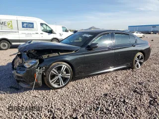 2018 BMW 7 Series 750i with VIN WBA7F0C57JGM23040, listed as a Copart auction lot 87392704 with 0 mi miles and Salvage Title. Bid and sale history available at carsss.com. Image 1.