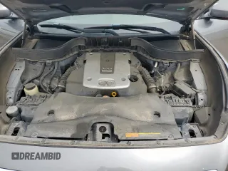 2017 Infiniti QX70 z VIN JN8CS1MU7HM141618, wystawiony jako Copart lot #59794075 z przebiegiem 114 272 mil mil oraz Szkoda całkowita • Salvage title. Historia ofert i sprzedaży dostępna na DreamBid. Obrazek 12.