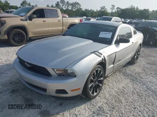 2012 Ford Mustang Premium with VIN 1ZVBP8AM7C5288124, listed as a IAAI auction lot 42280797 with 188,223 mi miles and . Bid and sale history available at DreamBid. Image 2.