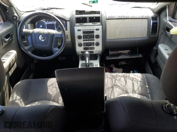 2008 Mercury Mariner z VIN 4M2CU81Z58KJ47051, wystawiony jako Copart lot #52448205 z przebiegiem 189 870 mil mil oraz Szkoda całkowita • Salvage title. Historia ofert i sprzedaży dostępna na DreamBid. Obrazek 8.