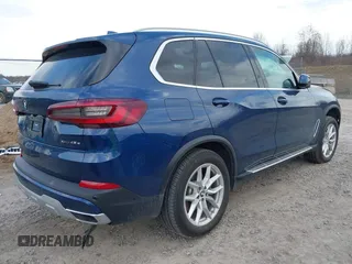 2021 BMW X5 xDrive45e with VIN 5UXTA6C07M9F32034, listed as a IAAI auction lot 41832720 with 28,453 mi miles. Bid and sale history available at carsss.com. Image 4.