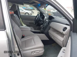 2014 Honda Pilot Touring with VIN 5FNYF4H91EB011934, listed as a IAAI auction lot 41929415 with 227,343 mi miles and . Bid and sale history available at DreamBid. Image 5.