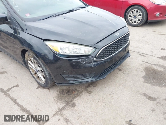 2015 Ford Focus SE with VIN 1FADP3F21FL355666, listed as a IAAI auction lot 41828579 with 110,002 mi miles. Bid and sale history available at carsss.com. Image 6.