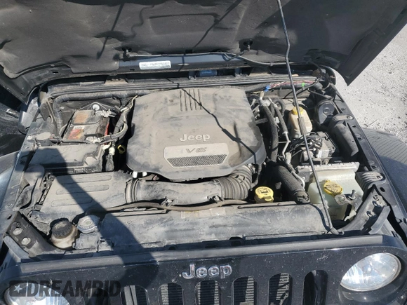 2015 Jeep Wrangler Sahara with VIN 1C4AJWBG5FL733795, listed as a Copart auction lot 61998255 with 86,655 mi miles and Salvage title. Bid and sale history available at DreamBid. Image 11.