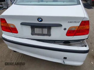 2004 BMW 3 Series 325i with VIN WBAAZ33444KP85964, listed as a IAAI auction lot 42024989 with 165,813 mi miles. Bid and sale history available at carsss.com. Image 12.