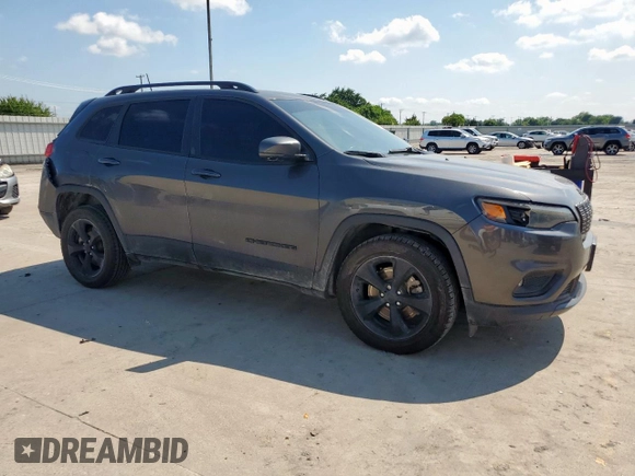 2019 Jeep Cherokee Altitude with VIN 1C4PJLLB8KD448427, listed as a Copart auction lot 58101445 with 173,007 mi miles and Salvage title. Bid and sale history available at DreamBid. Image 4.