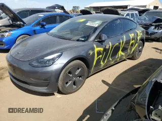 2023 Tesla Model 3 Long Range z VIN 5YJ3E1EB1PF688455, wystawiony jako Copart lot #53554555 z przebiegiem 21 922 mil mil oraz Nie do naprawy • Non repairable. Historia ofert i sprzedaży dostępna na DreamBid. Obrazek 1.