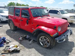 2018 Jeep Wrangler Unlimited Sahara z VIN 1C4HJXEG6JW174359, wystawiony jako IAAI lot #42009968 z przebiegiem 79 830 mil mil oraz . Historia ofert i sprzedaży dostępna na DreamBid. Obrazek 1.
