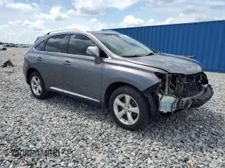 2012 Lexus RX 350 with VIN 2T2BK1BA5CC138105, listed as a Copart auction lot 63394215 with 164,909 mi miles and Salvage title. Bid and sale history available at DreamBid. Image 4.