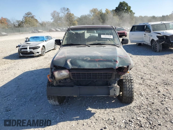 2000 Isuzu Trooper S with VIN JACDJ58X2Y7J11793, listed as a Copart auction lot 77431754 with 214,854 mi miles and Clean title. Bid and sale history available at DreamBid. Image 5.