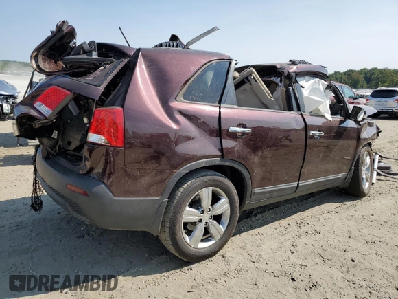 2012 Kia Sorento EX with VIN 5XYKU4A62CG222061, listed as a Copart auction lot 71044124 with 218,770 mi miles and Salvage Title. Bid and sale history available at carsss.com. Image 3.