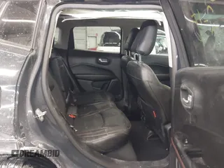 2018 Jeep Compass Trailhawk with VIN 3C4NJDDB2JT211775, listed as a IAAI auction lot 41610112 with 99,238 mi miles and . Bid and sale history available at DreamBid. Image 8.