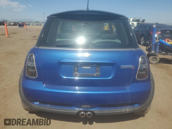 2005 MINI Hardtop S with VIN WMWRE33415TD90833, listed as a Copart auction lot 61238165 with 174,647 mi miles and Salvage title. Bid and sale history available at DreamBid. Image 6.