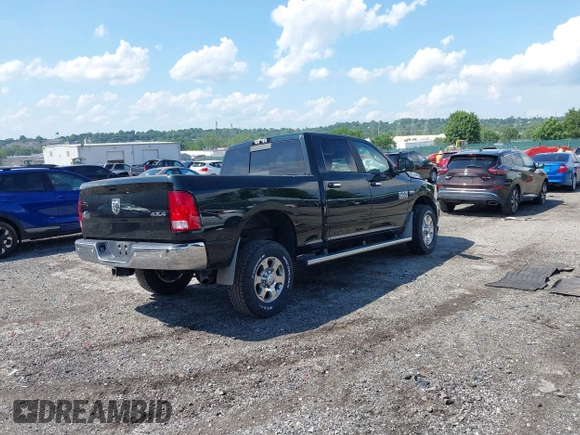 2018 Ram 2500 SLT with VIN 3C6TR5DT2JG166397, listed as a IAAI auction lot 42551256 with 100,040 mi miles and . Bid and sale history available at DreamBid. Image 4.