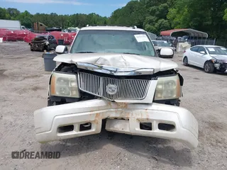 2003 Cadillac Escalade с VIN 1GYEC63T83R134948, выставлен на аукционе IAAI как лот 42321391 с пробегом 289 207 миль миль и . История ставок и продаж доступна на DreamBid. Изображение 12.