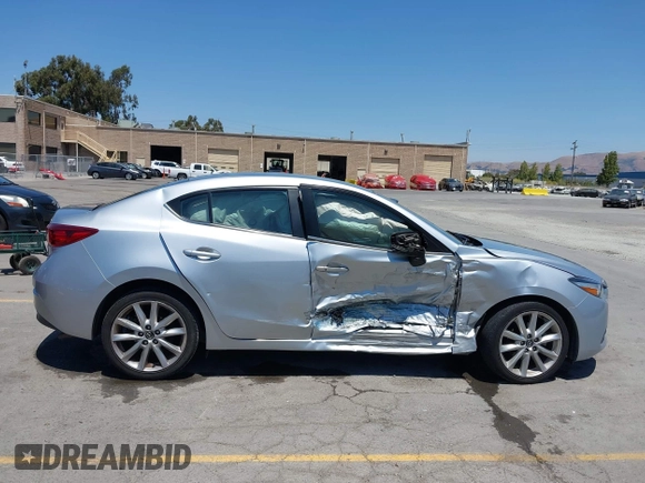 2017 Mazda 3 Touring with VIN 3MZBN1V76HM119389, listed as a IAAI auction lot 42772015 with 128,555 mi miles and . Bid and sale history available at DreamBid. Image 13.