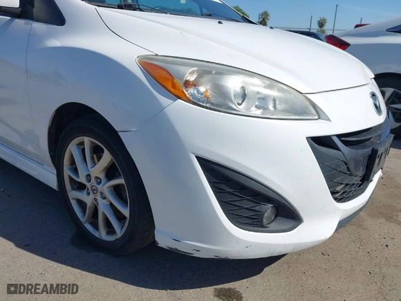 2012 Mazda Mazda5 Touring with VIN JM1CW2CL7C0140452, listed as a IAAI auction lot 41970209 with 92,069 mi miles. Bid and sale history available at carsss.com. Image 20.
